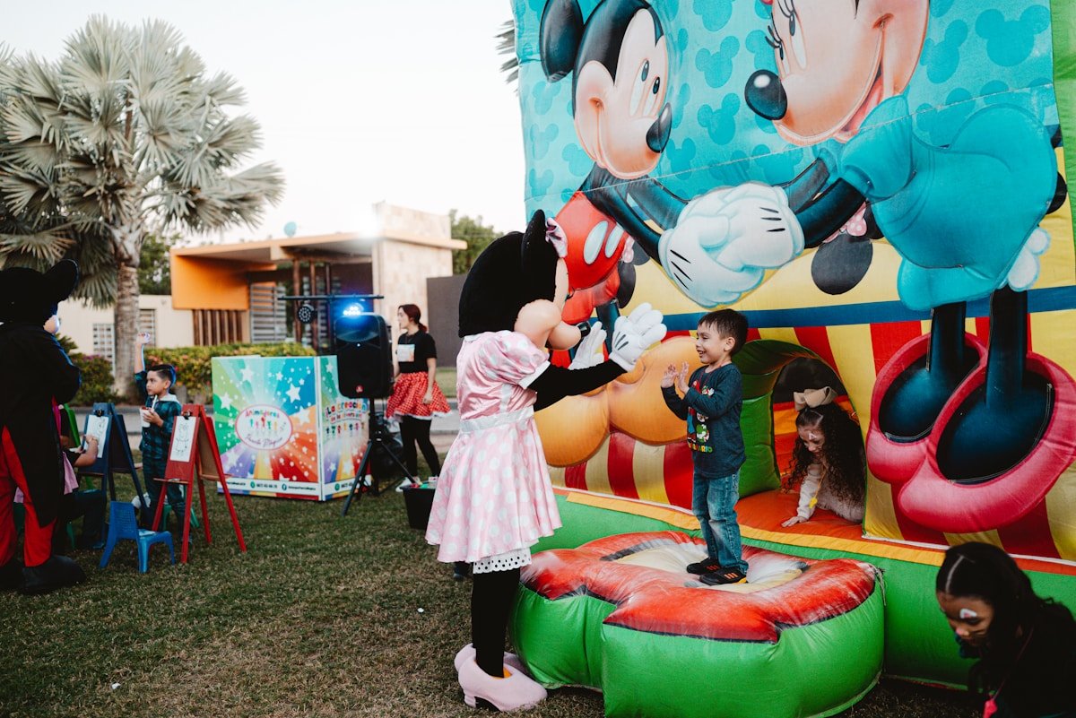 Kids Having Fun with Inflatables — Ultimate Party Rentals