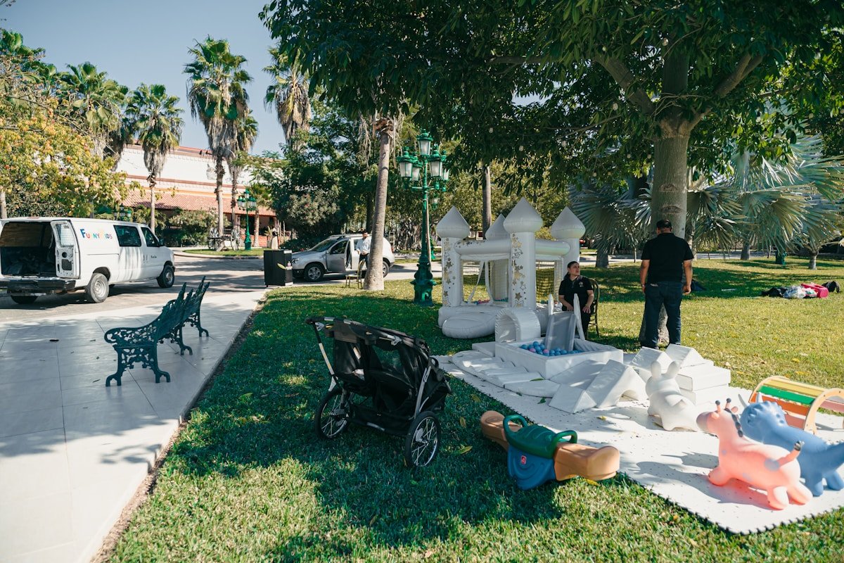 Bounce House at Community Park Event — Ultimate Party Rentals