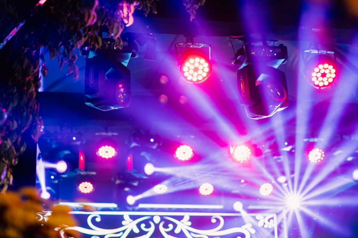 Vibrant Colored Uplighting in Event Hall — Ultimate Party Rentals