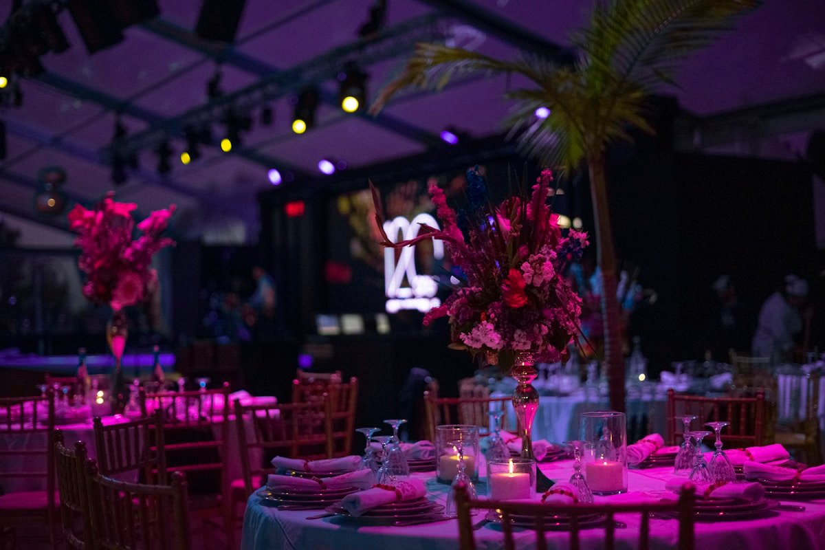 Colorful LED Uplighting at Evening Event — Ultimate Party Rentals