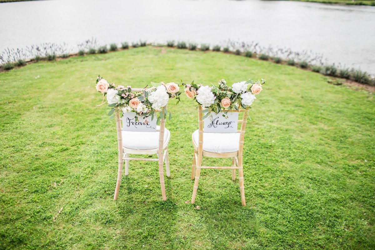 Gold Chiavari Chairs at Elegant Ceremony — Ultimate Party Rentals