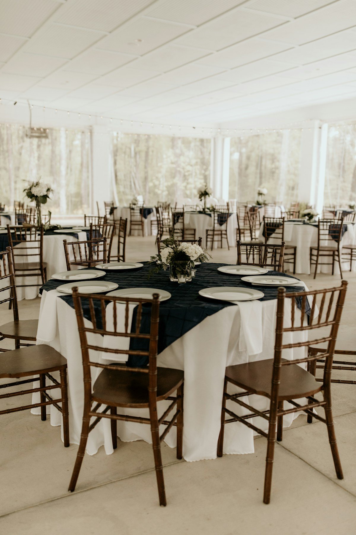 Corporate Round Tables with White Linens — Ultimate Party Rentals