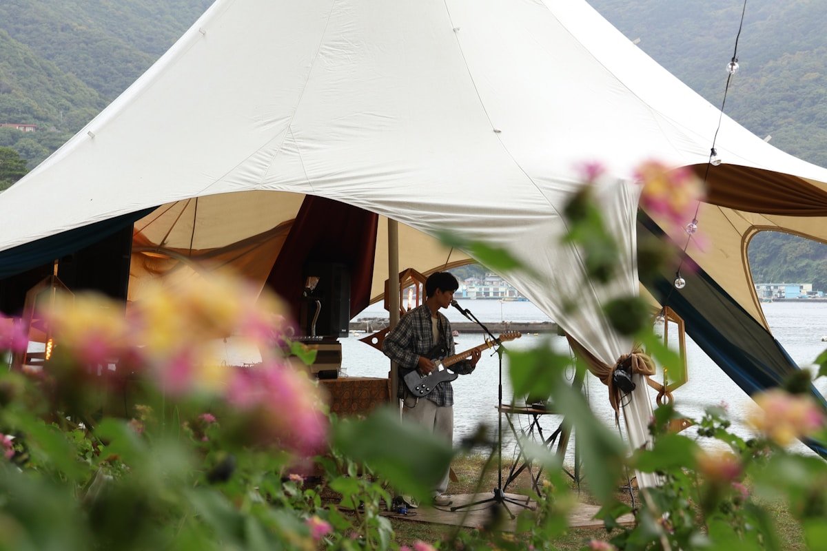 Bohemian Outdoor Tent with Natural Décor — Ultimate Party Rentals